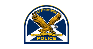 St. Petersburg Police Department Logo featuring a golden eagle with a white head emblazoned over a blue and white shield with the text stating St Petersburg Police